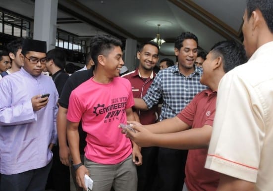 Khairy having some light moments with UTM student before leaving the Senate Hall 