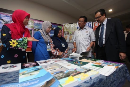 Prof. Azlan (most right) with Datuk Hj. Abd. Latif visiting the exhibition booths at ICURP 2014