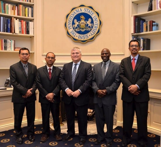 Taking a group photo with Penn State University President, Prof. Eric Barron (third left)