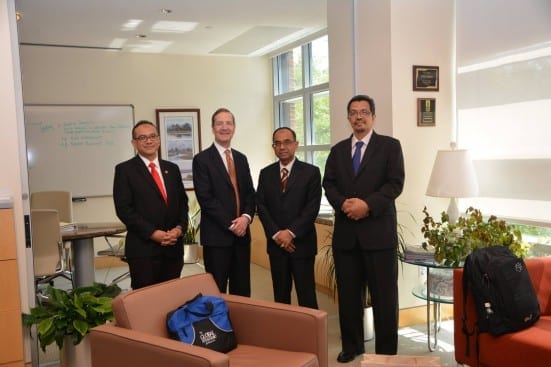 With Dean of Smeal Business School, Charles Whiteman (second left)