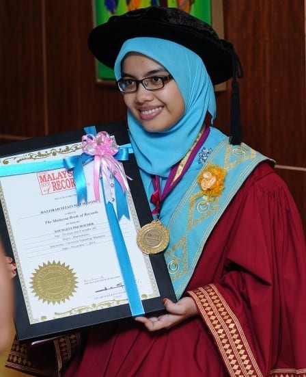 Dr. Hazzirah Izzati Mat Hassim, the youngest PhD graduate of UTM in 2014 with recognition certificate from Malaysia Book of Record.  She was 24 years old at the 53rd UTM Convocation ceremony.