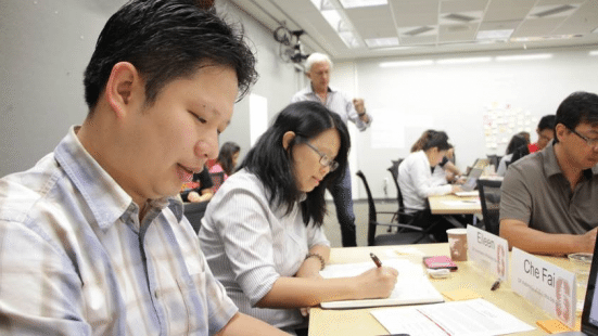 Dr Yeong and Dr Eileen in classroom among 42 founders of 22 startup participating in MaGIC e@Stanford program.