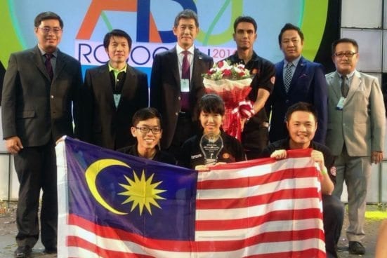 Dr. Ridzuan Ahmad (standing third from right) with UTM team after the closing ceremony of ABU ROBOCON 2016 at Bangkok, Thailand