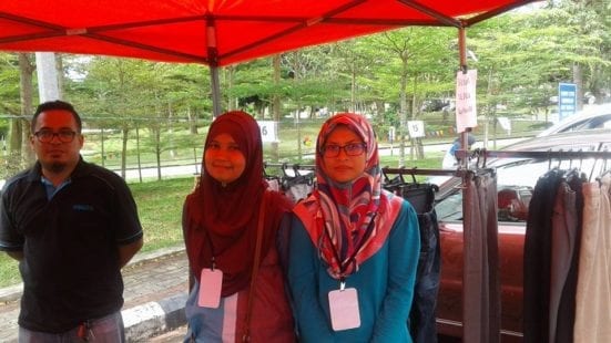 Siti Norazrina (most right) standing in her own stall at FKA Car Boot Sale.