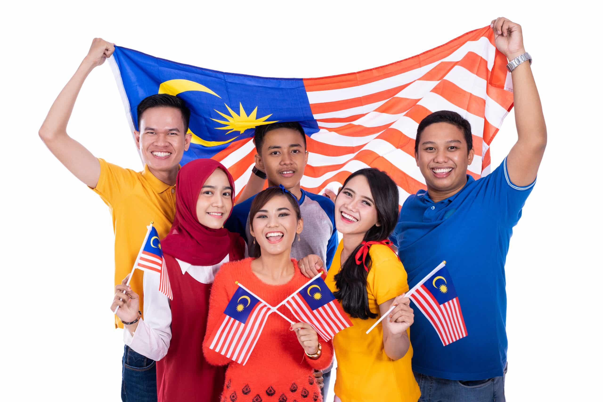 people holding malaysia flag celebrating independence day