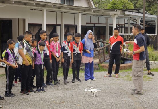 Hands-On Innovation: Dr. Alvin Lau Meng Shin demonstrates the use of drone technology for thermal surface mapping during the Earth Calling Boot Camp 2025, showcasing advanced tools for environmental monitoring to inspire the next generation of climate action leaders