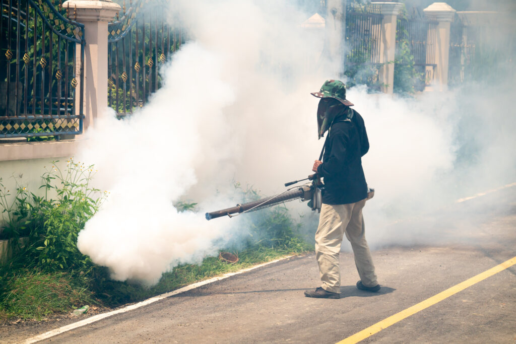 man use fumigation mosquitoes machine for kill mosquito carrier