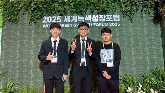 Team Kimcheeez — Lau Yan Kai, Lee Yin Shen, and Brendan Chia Yan Fei at the hackathon venue in LAHAN Hotel, Pohang.