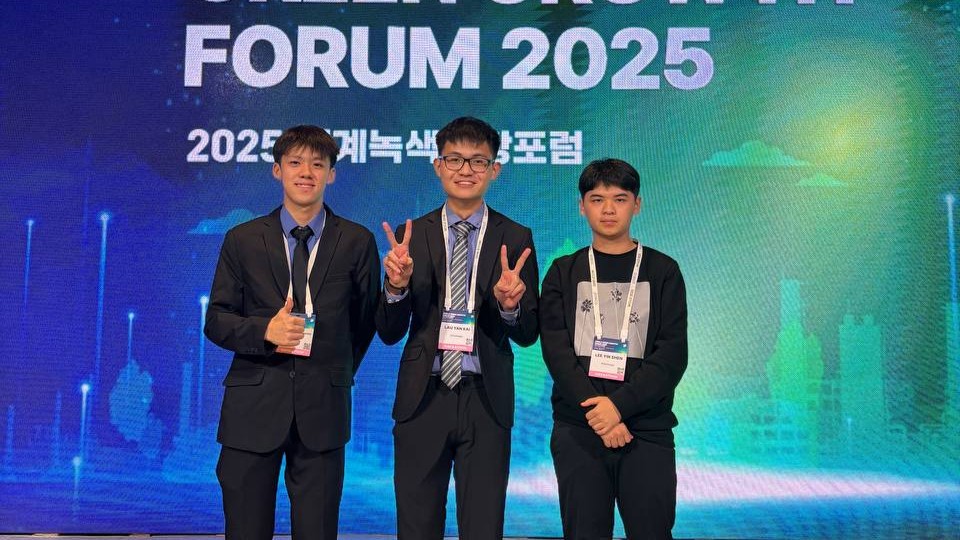 Lau Yan Kai, Lee Yin Shen, and Brendan Chia Yan Fei at the hackathon venue in LAHAN Hotel, Pohang.